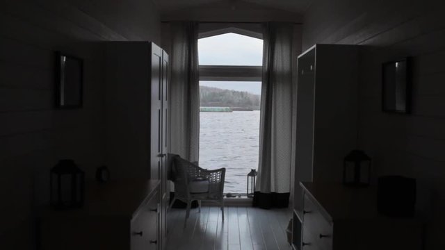view of the lake from the window of the house