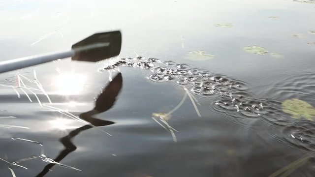 Man swimming on a boat in sunny day in Finland