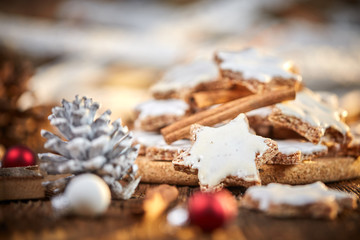Christmas cinnamon starts with pine coins and christmals balls