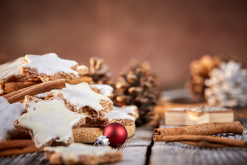 Christmas background with table of cinnamon cookies