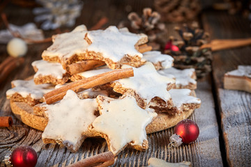 Christmas background with table of cinnamon cookies