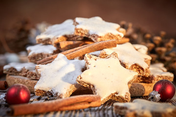 Christmas background with table of cinnamon cookies