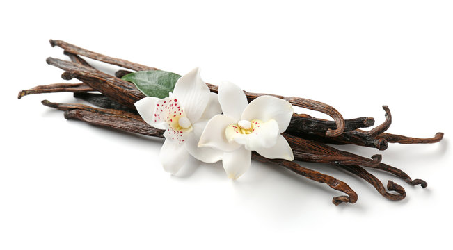 Vanilla sticks and flowers, isolated on white