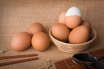 Set Eggs in a basket on  gunny (sackcloth)  background