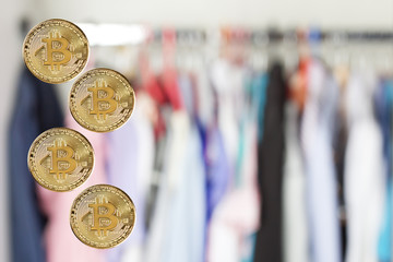 Bitcoin in the background with clothes hanger