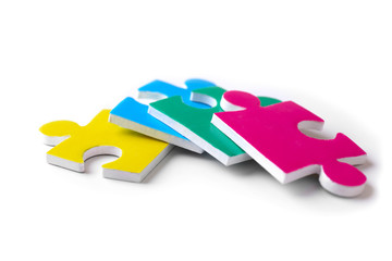 Puzzle pieces on white background as symbol of autism
