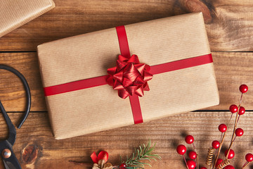 Christmas present on rustic wooden background