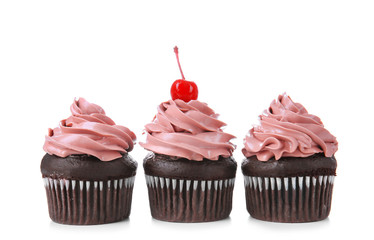 Delicious chocolate cupcakes on white background