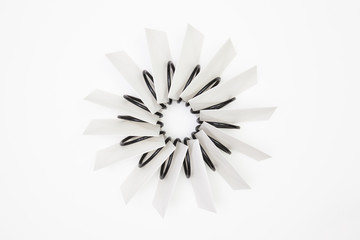 Obraz premium Propeller of white envelopes on the white table