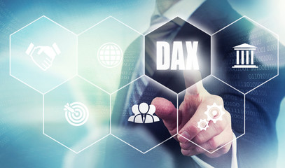 A businessman pressing a DAX button on a futuristic computer  display