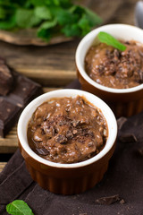 Chocolate custard cream dessert Vla served with mint leaves