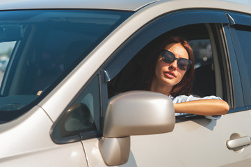 Beautiful woman in the car