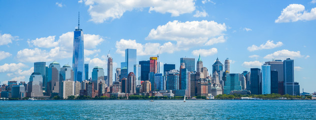 Lower Manhattan cityscape from Ellis Island dock.