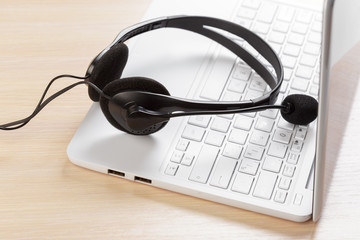 headset on keyboard computer laptop