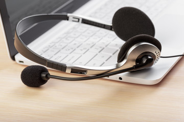 headset on keyboard computer laptop