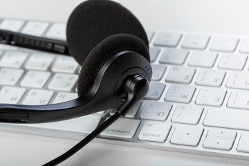 headset on keyboard computer laptop