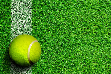 Tennis Ball on Grass Court With Copy Space