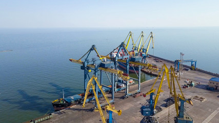 Aerial view Port. Port cargo cranes and ship. Sea