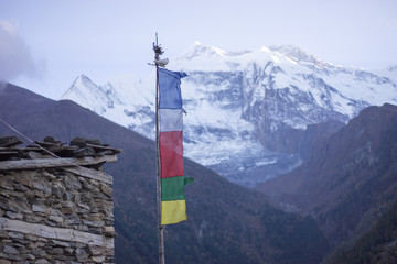 Buddhist gompa and prayer flags in the Himalaya mountains, Nepal