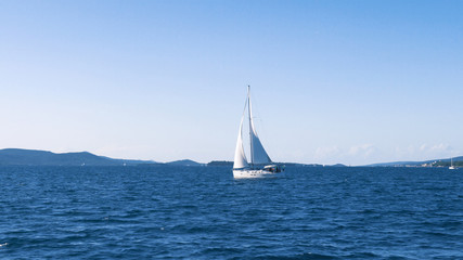 Sailing. Ship yachts with white sails in the Sea. Luxury boats. Boat competitor of sailing regatta.