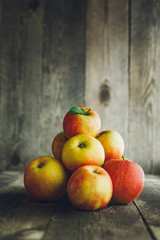 Apples on wooden background