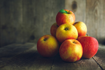 Apples on wooden background
