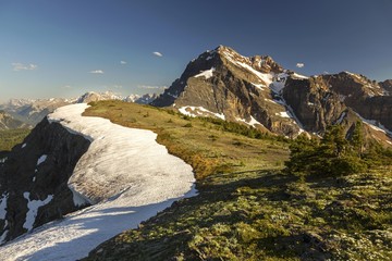 Monarch Ramparts and Distant Mountain Peak Landscape on Continental Divide above Healy Pass in Banff National Park, Canadian Rocky Mountains