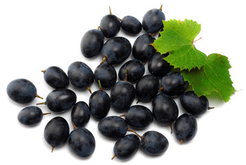 blue grapes berries with leaves isolated on white. top view