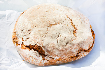 Traditional Majorcan brown bread, pan moreno, on the table