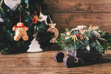 Christmas Gifts with Boxes on Wooden Background. Vintage Style. Closeup, selective focus. Toy,...