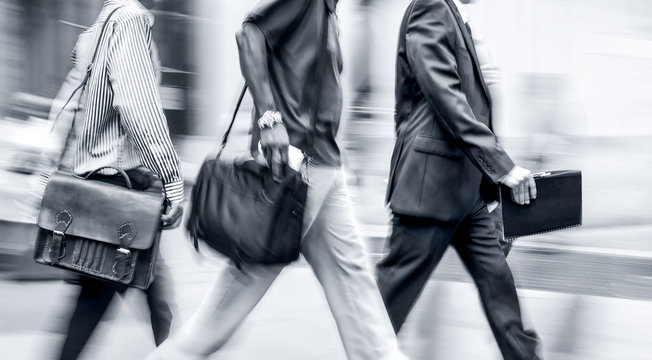 group of business people in the street in monochrome blue tonality