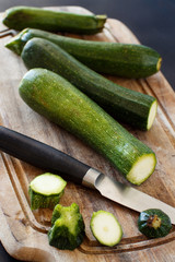 Fresh zucchini on wooden board