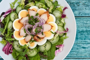 delicious salad with chicken breast and vegetables, Caesar salad