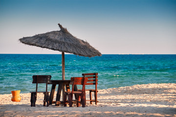 Beach cafe on seashore.