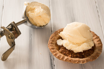 Mini Pecan Pie with a Scoop of Vanilla Ice Cream