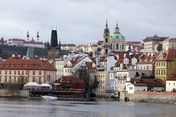 Fototapeta premium View on the autumn Prague St. Nicholas' Cathedral, Czech Republic