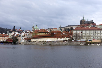 View on the autumn Prague gothic Castle above River Vltava, Czech Republic