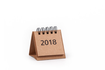 2018 Cardboard calendar on a white background. Free text space.