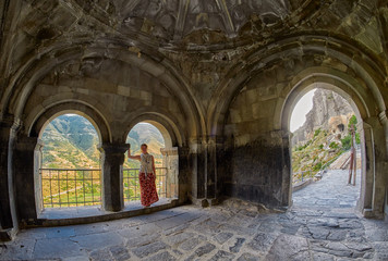 Fototapeta na wymiar Young woman in Vardzia Cave Monastery of Georgia
