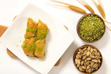 traditional turkish baklava slice on plate with pistachio