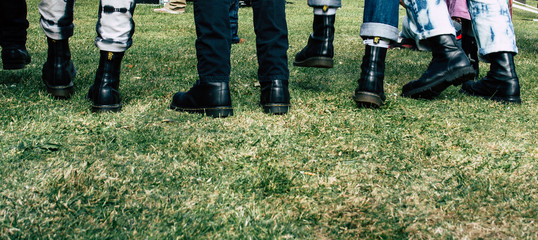 Punks dancing in a field