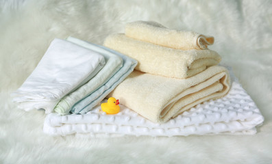 Children's towel on white fur.