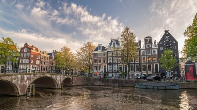 Amsterdam city skyline sunset timelapse at canal waterfront, Amsterdam, Netherlands 4K Time Lapse