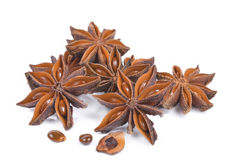 Star anise spice fruits and seeds isolated on white background