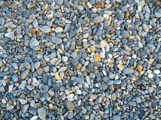 Nature background from gray sea pebbles