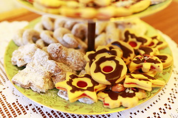 Traditional Czech Christmas sweets with shape of horseshoe and stars served on a plate 
