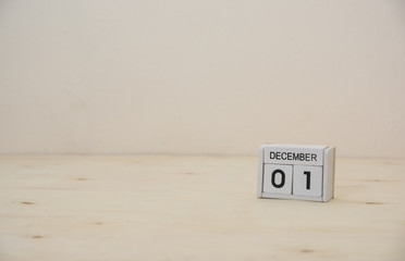  AIDS day 1 December wooden cube calendar on wood surface with copy space