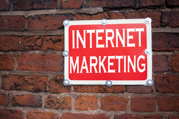 Hand writing text caption inspiration showing Internet Marketing concept meaning Technology Strategy Design written on old announcement road sign with background and copy space