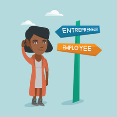 Young woman standing near the road sign with two career pathways - entrepreneur and employee and choosing career way
