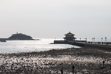 Backlit island in the sea